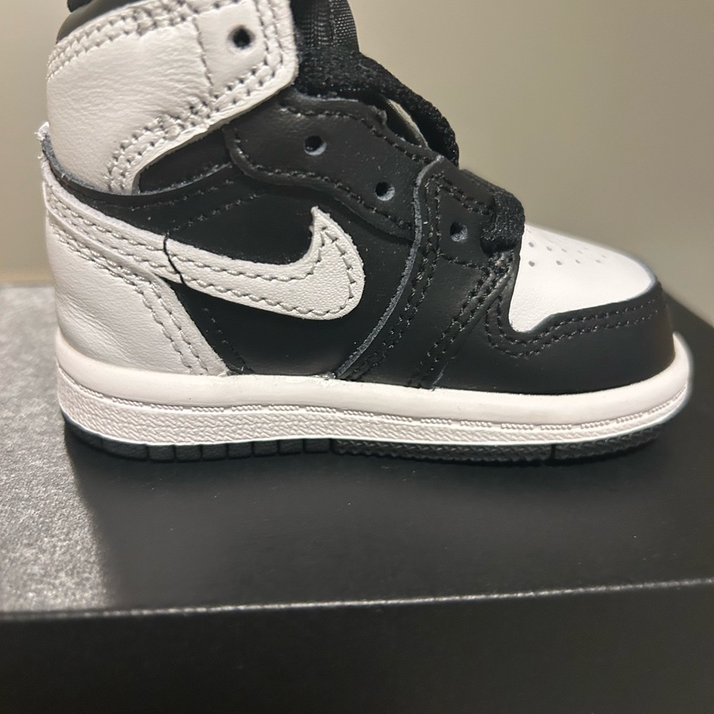 Jordan Kids Black and White High-Top Sneakers